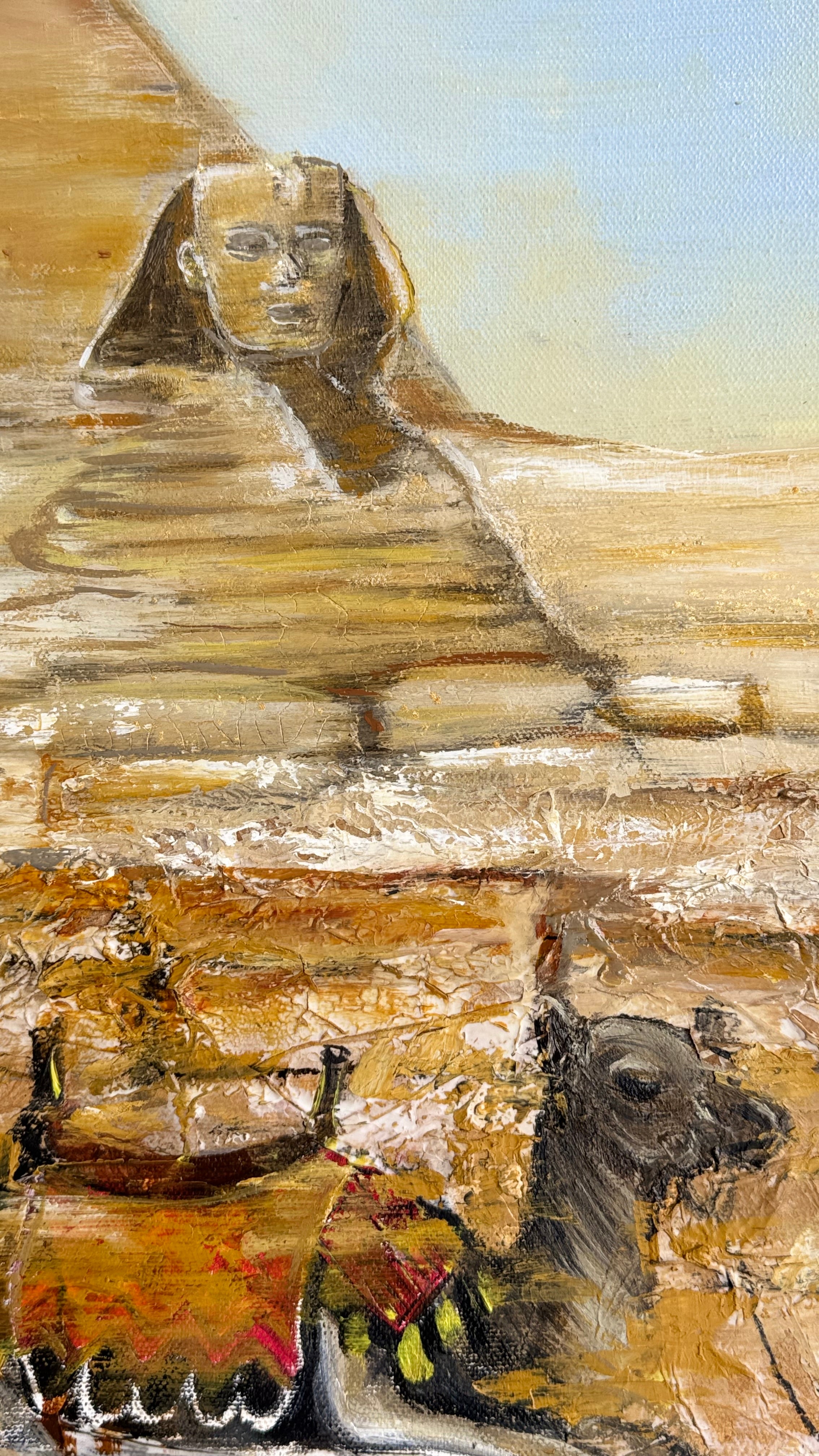 Close-up detail of textured mixed media painting showing Sphinx and camel in desert tones