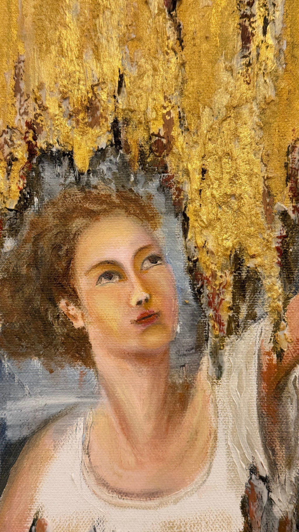 Close-up detail of gold textured painting with classical portrait element, inspired by Italian masters, featuring rich surface and luminous golden tones