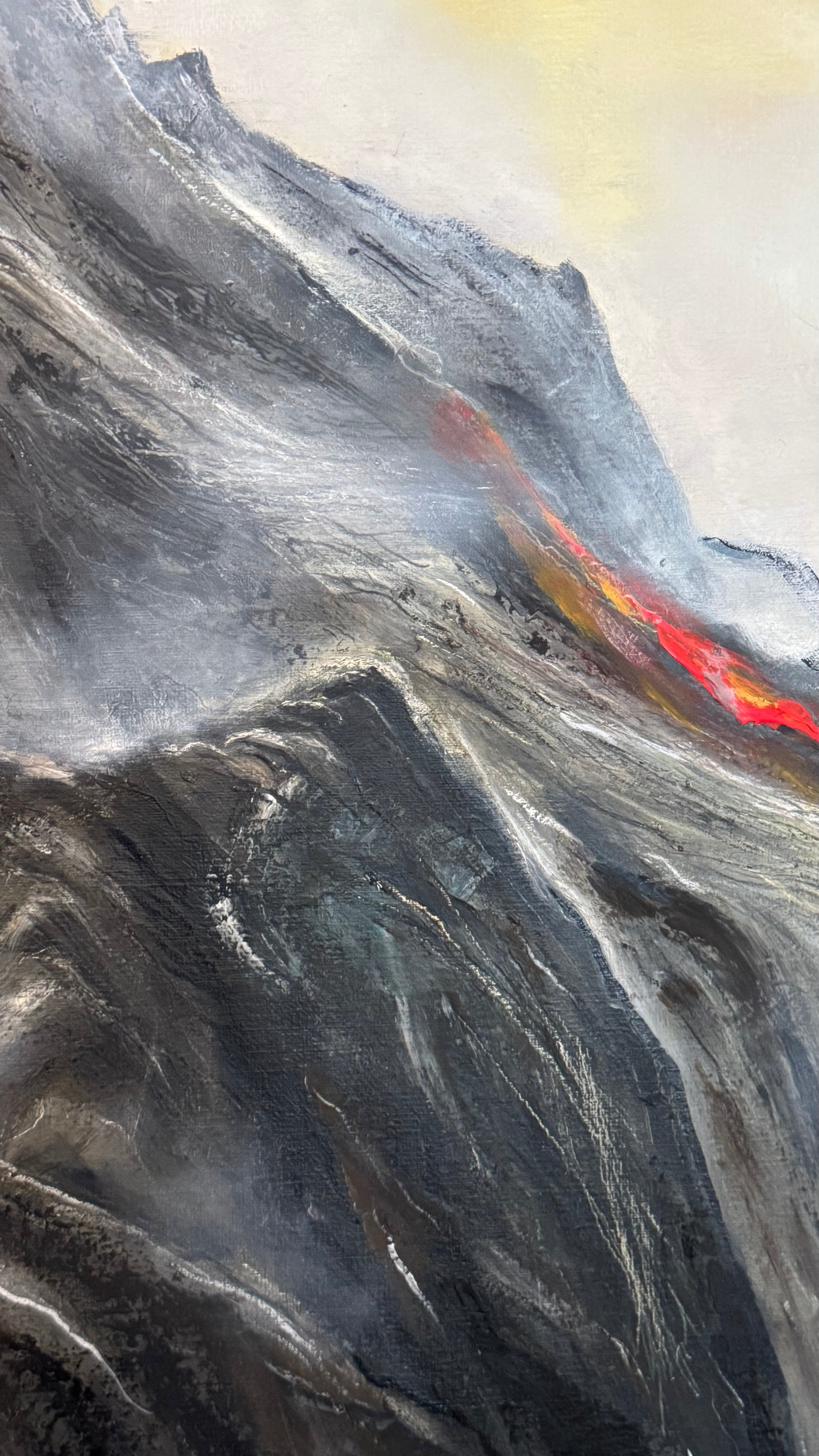 Close-up of textured mountain landscape painting with volcanic red accent and atmospheric grey tones